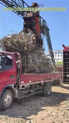 Heavy Machinery Unleashed: How Scrap Metal Moves from Truck to Ground