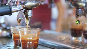 Download Closeup of tea maker machine during making tea shots drip in modern coffee shop - hot tea making machine concept for free