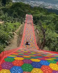 Sliding through summer. This rainbow slide is located in El Boquerón in El Salvador, a fun sight that makes us want to travel to bright and sunny destinations. 🌈 While travel is still restricted in many parts of the world, it pays to spend time on activities that boost your energy and make you feel happy—even indoors. Whether it's listening to summer playlists, sipping on tropical beverages, or wearing brighter colors, what do you do to get into a summer mood? 🌞 📽 credits: @romkfr . . . #thin