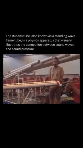 How Everything Works on Instagram: "A Rubens tube, also known as a standing wave flame tube, is a physics apparatus that makes sound waves visible by translating pressure changes into patterns of fire. It consists of a long, sealed metal tube with evenly spaced holes along the top and a speaker attached to one end, while the tube is filled with a flammable gas such as propane. When no sound is played, the gas escapes evenly and all the flames rise to the same height. But when a steady tone trave