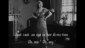 CIRCA 1933 - Lillian Roth concludes a sing-along to "Ain't She Sweet?"