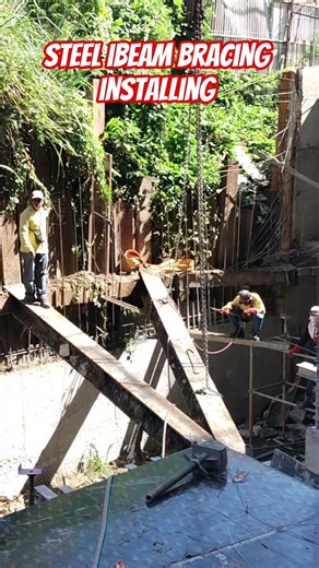 Steel I-beam bracing installing. #construction #shorts