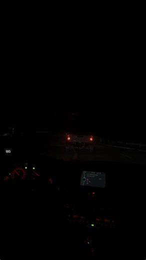 Nighttime Driving: A Car Journey on Busy Roads