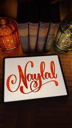 Replying to @morena handlettering the name Naylal in cursive writing!! Tell me what names you want to see me write next! Happy Lettering 🫶✍️ #letteringwithamylea🖋️ #calligraphy #writingnames #digitalartists #artasmr