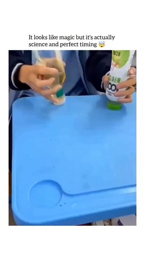 guffvibes on Instagram: "The video shows a person performing a unique and skillful bottle-stacking trick. Unlike a traditional bottle flip where the goal is to land a bottle upright on its base, this trick involves landing a spinning bottle upside down on its cap, and then stacking a second bottle on top of it. Key Highlights The First Flip: The person launches a partially filled plastic bottle into the air with a specific spin. It lands perfectly balanced on its small cap on a blue table. The P