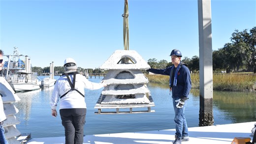 Coalition drops concrete pyramids in Georgia marsh to build reefs