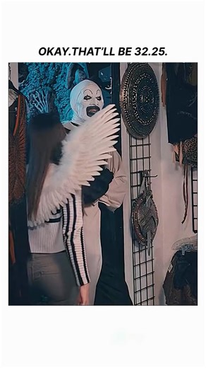 Ella on Instagram: "This iconic scene features the silent and sinister Art the Clown from the 2022 slasher hit Terrifier 2. In this specific clip, Art is engaging in his signature psychological torment, messing with Sienna Shaw (played by Lauren LaVera) in a costume shop. Sienna, dressed as a Valkyrie angel, is understandably creeped out as Art mimics her and plays with shop items like the "sunglasses and party horn"—a masterclass in building tension before the inevitable chaos. 🎥 Film Review: 