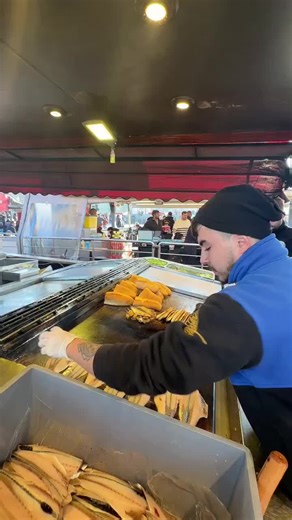 Preparing Traditional Fish and Bread on a Turkish Boat
