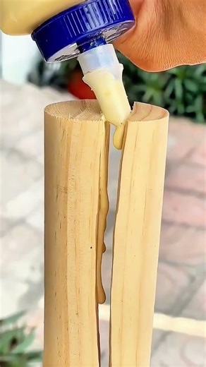 Twine threads bamboo—fresh split held firm, garden air hums with quiet craft