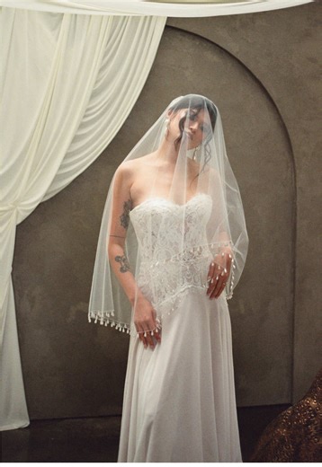 Let’s talk veil fabrics! In this journey making veils I have realized one thing I love the most is using unique fabrics - don’t get me wrong, there is something beautiful about a traditional bridal veil with tulle and a pretty trim (that’s what I wore for my wedding), but when I started exploring the world of bridal fabrics and looking at things with a more creative eye, I realized you can make so many other fabrics and materials into a veil! I am in LOVE with making something different - I thin