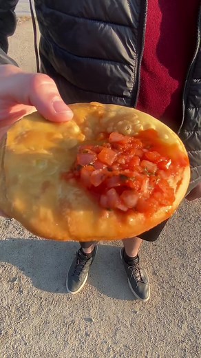 Chilean Street Food Delight: Savoring Sopaipilla in Santiago