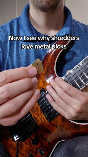 You barely have to touch the string 😳 I'm using the Purple Plectrums Venus pick but I also love the stainless steel Artimesia Because the material is so hard and heavy, the lightest tap makes the string vibrate with a strong attack. Hand polished picks are a plus because they'll glide through the string with little resistance. This is incredibly useful for good economy of motion during alternate picking. It's like a secret boost for metal shred guitar. 🔥 #guitargear #guitarpick #leadguitar #es