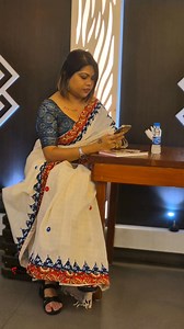 • This cream dhonekhali cotton saree has a subtle grid texture and a striking border. • The pallu and borders feature deep blue triangular motifs with white florals, framed by a rust-red Kalamkari-inspired strip with cream floral designs. • Small blue and red dots are scattered across the cream base. And perfect for any professional to casual occasion. Sheli's fashion: a perfect fusion of tradition and trend. For any inquiries - 9007918284 #sareestyle #SareeFashion #boutique #exclusive #onlinesh