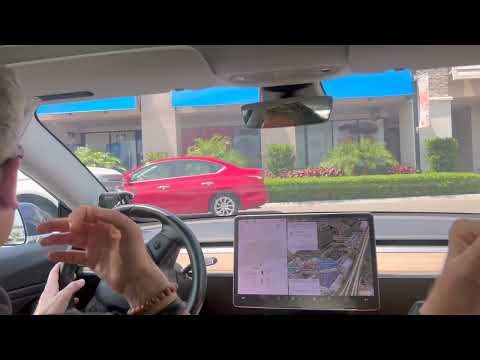 Tesla FSD (Supervised) Version 12.3.3 Drives through Roundabouts