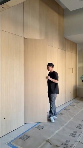 Beautiful hidden door wall, using our PC clips to attach the panels