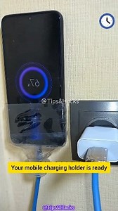 How to Make a Mobile Charging Holder from a Plastic Bottle!" #reelsfbシ #fypシ #reel #diy #lifehack #mobilechargingholder #plasticbottlehack #TechHacks #diychargingholder #diyideas | Tips&Hacks