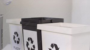 Process of sorting garbage in sorting containers for recycling Stock Video