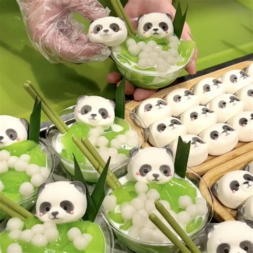 Try this #panda desert for #summer in #Chengdu! It's a bowl of pandan-infused jelly drenched in a coconut milk bath, adorned with glutinous rice balls, bamboo leaves and matcha biscuits. Who can resist such cuteness? #FunChina #Delicacy #foryou #virals #viralreelsfb #Delicacy #yum | China Plus Culture