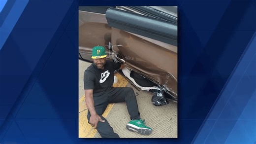 Man holds stranger's hand until help arrives after car 'went in the air and landed'