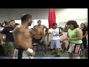 Male vs Female Bare Knuckle MMA FightMan vs. Woman MMA challenge match in Brazil.