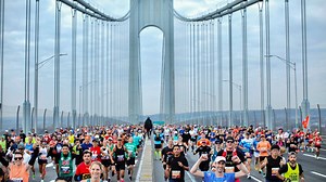 And they're off! Thousands of marathon runners take to the streets of NYC