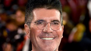 Simon Cowell rushed to hospital with broken back after bike accident