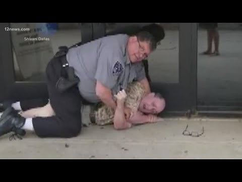 Disabled vet cleared of charges, security guard charged after assault over tattered American flag