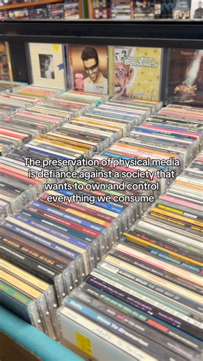 @thebrooklynbruja on Instagram: "The preservation of physical media has always been important- now more than ever it is imminent we don’t let it die out. The preservation of physical media is our way of celebrating our human history and celebrating our autonomy! It is our right to own things and to consume media without the intervention of streaming services dictating what they deem worth consuming, without the ability to go in edit, delete and regulate the things we enjoy. Ai continues to grow