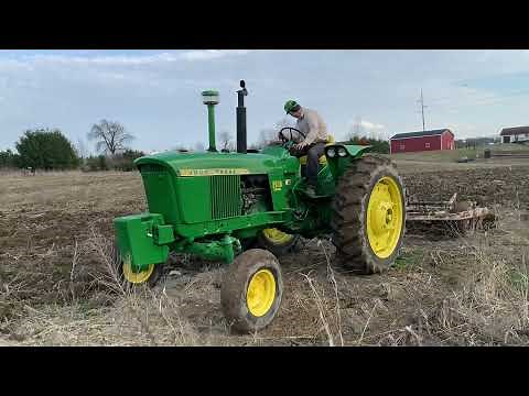 Rebuilt John Deere 2510 Pulling a 7 Shank Graham Model BS 7 Chisel Plow