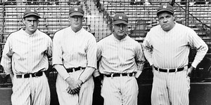 Which team was the first to put numbers on the backs of its players' uniforms?