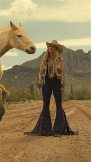 In honor of playing @rodeohouston tonight, I’m releasing the Wildflowers and Wild Horses music video and it’s out now! 🐴🌾🌻This one has always been about grit, determination, and forging your own path so we had to have a video to match. Y’all check it out. #wildflowersandwildhorses | Lainey Wilson