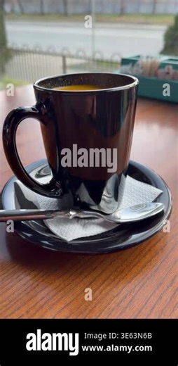 sea buckthorn, sea buckthorn tea in a cup on the table, window and street view Stock Video Footage - Alamy