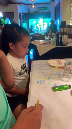 Maria practices math wile waiting for dinner