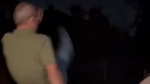 Man falls backwards into fire pit attempting to volley football