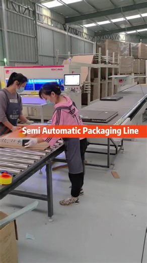 Semi-automatic packaging line for custom cabinetry factory. #furniturepackages #packagingline #customcabinets #packagingmachine