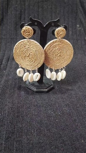 “Twirl into summer with these Rafia Earrings! 🌿✨ #HandmadeVibes”