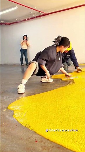 Applying Seamless Yellow Epoxy Gravel Flooring for Durability