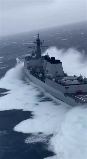 Majestic Warship Sailing Through Open Seas 🌊