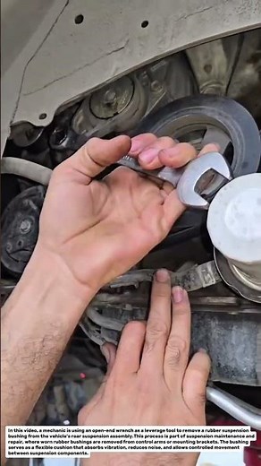Automotive Suspension Bushing Removal with Open-End Wrench.