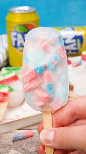FANTA ICE LOLLIES 😍 Ice Lolly Hack! It’s so hot these past couple of weeks, so why not beat the heat with these super easy Fanta Lemon Ice Lollies! If something could taste like being on holiday, then these are it! ✨Just add your favourite sweets to an ice lolly mould, cover with Fanta Lemon and freeze overnight! | Planet Food