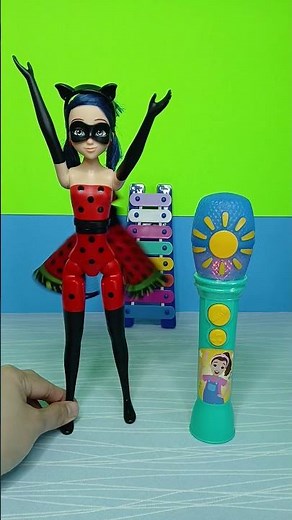 Cool microphone and transforming Miraculous doll