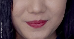 The female lips were chewing food in her mouth