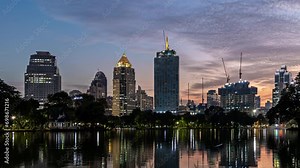 Modern city view, modern high-rise buildings at sunset, cityscape, business centers and corporate buildings