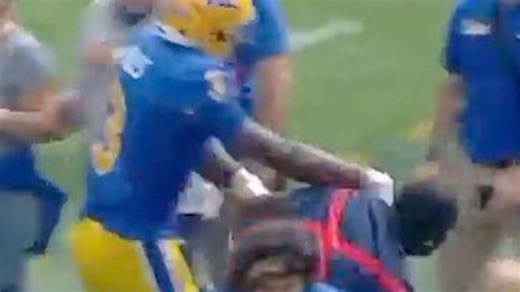 College football players 'go to war' with ball boy in shocking scenes