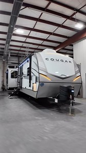 Check out this awesome camper! This is the Cougar Half Ton 33RLI! #rv #camper #camping #travel #trailer #van #vanlife #rvlife #glamping | Lakeshore RV Center