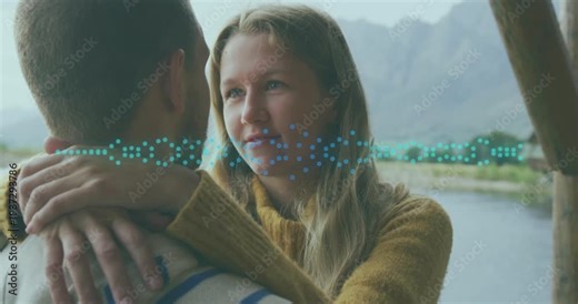 Woman hugging man lake, leaning in speaking, showing bond causing dotted waveform drifting for ads