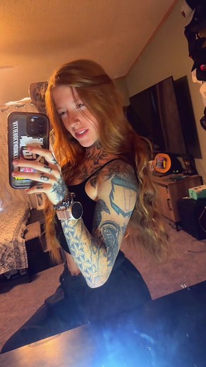 Embracing Red: The Allure of Tatted Redheads