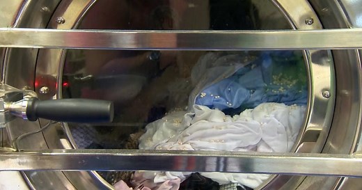 British scientists have developed a new washing machine that uses plastic beads to help get stains out of clothes