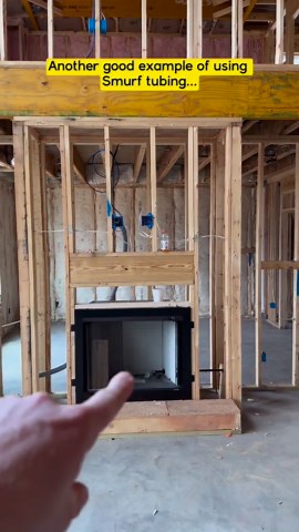 Dennis Comstock - Builder Brigade on Instagram: "✅The Ultimate Home Building Checklist on my site #BuilderBrigade ✅ ✅ This homeowner is using smurf tubing behind their TV so they can run wiring from the TV down into the built-in cabinets. The TV components like Apple TV, satellite, cable box, audio, and gaming systems can all be hidden inside the cabinets next to the fire place and the wiring can be added and removed easily because they have conduit (smurf tubing) installed behind the TV. #Build