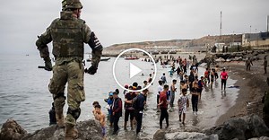 Thousands of Migrants Cross Into Spanish Enclave